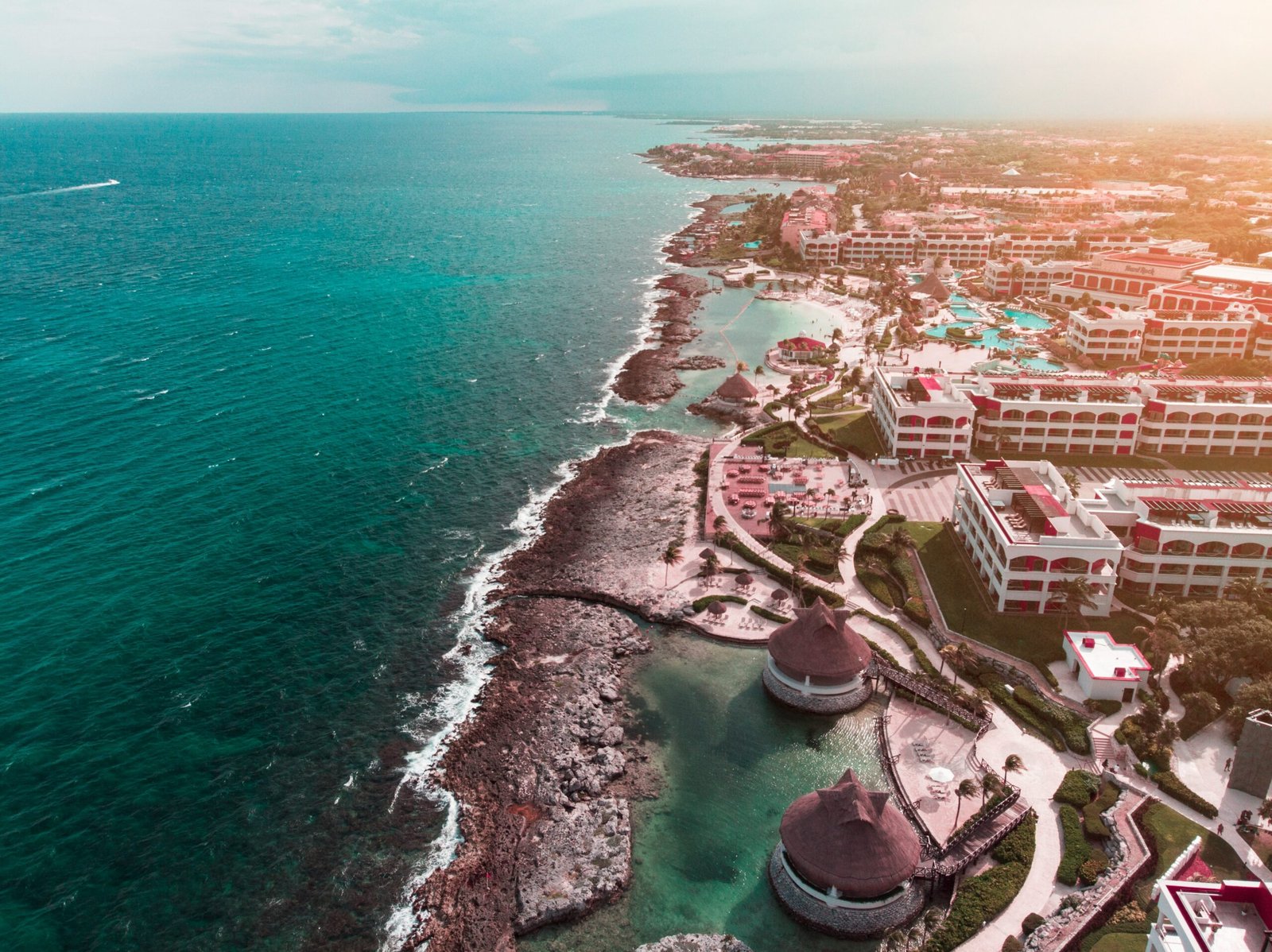 aerial view of hotels and resort facing ocean